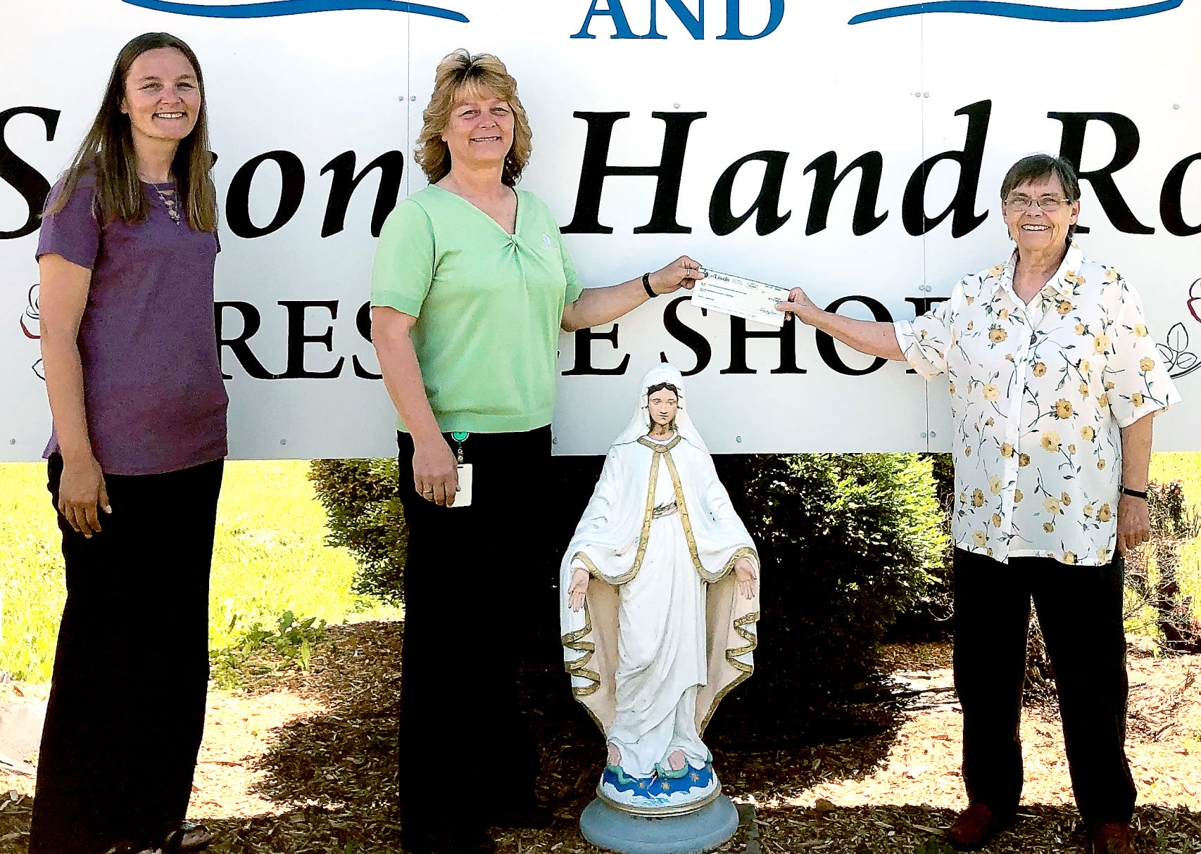 LLCU donates to Catholic Charities
